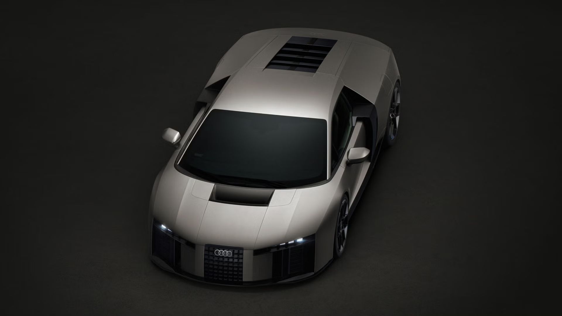 Eine von oben genommene Dreiviertelansicht des Audi Nuvolari, die sein plastisches Design und seine markanten Proportionen hervorhebt.