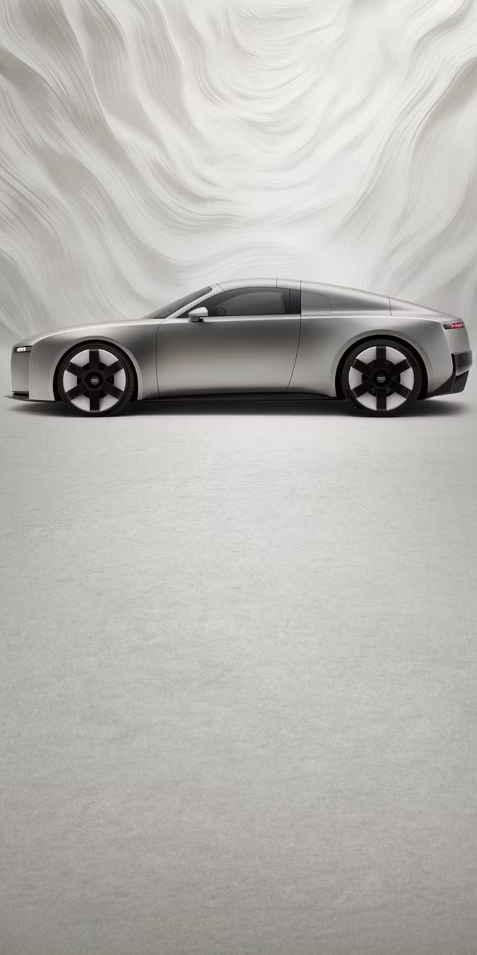Vista lateral de um Audi Concept C na frente de um fundo gráfico