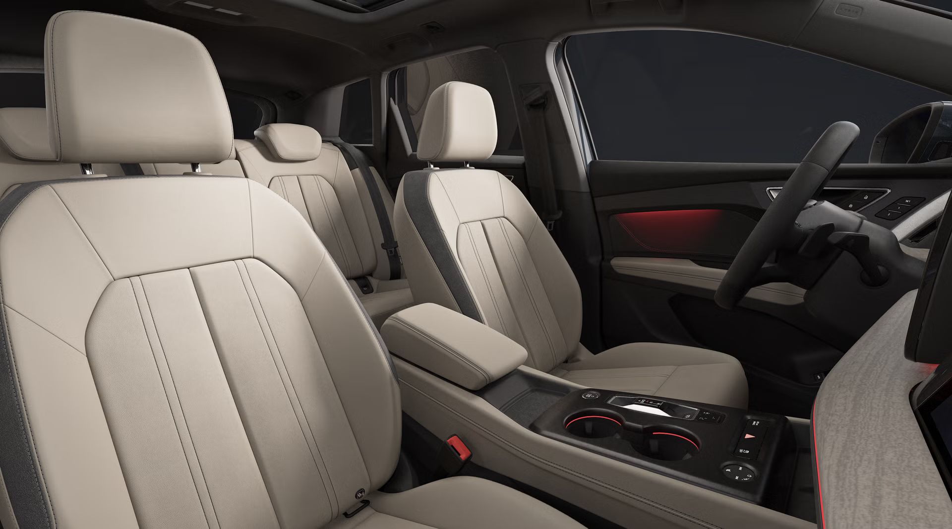 Blick auf den Innenraum des Q4 SUV e-tron mit Cockpit, Vordersitzen und Rückbank.